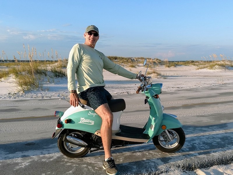 Chris Schroder on scooter, Gulf Islands National Park