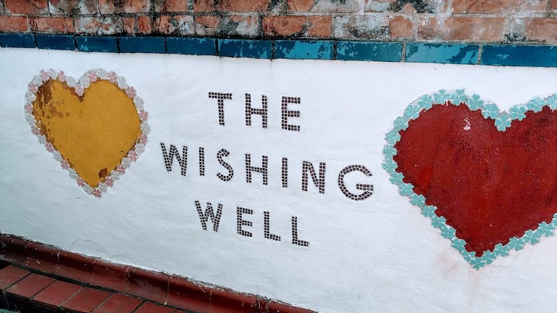 Wishing Well sign at Beer Can House