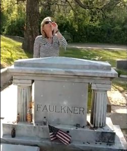 taking shot at Faulkner's grave