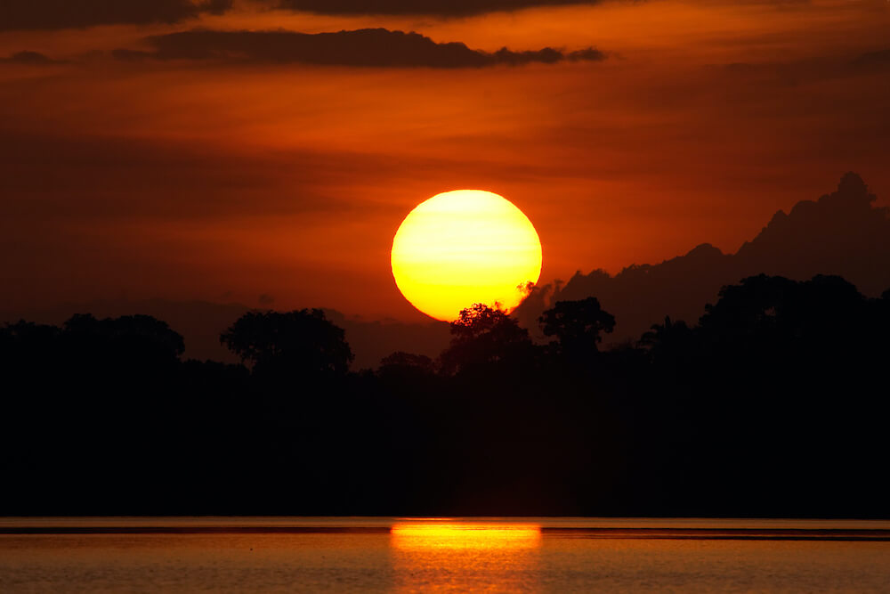 sunset over Juma River in Brazil
