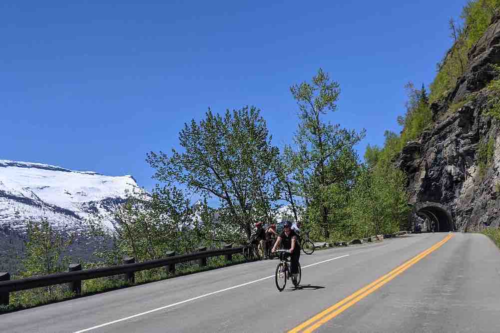 person biking in Glacier National Park