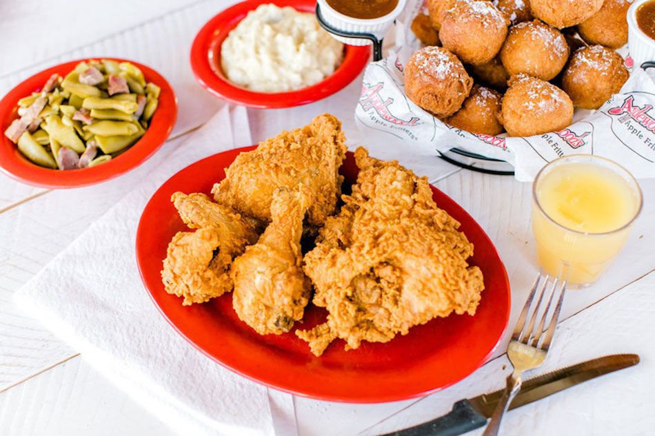 fried chicken, side dishes and apple fritters at Applewood Farmhouse Restaurant in sevierville, tennessee