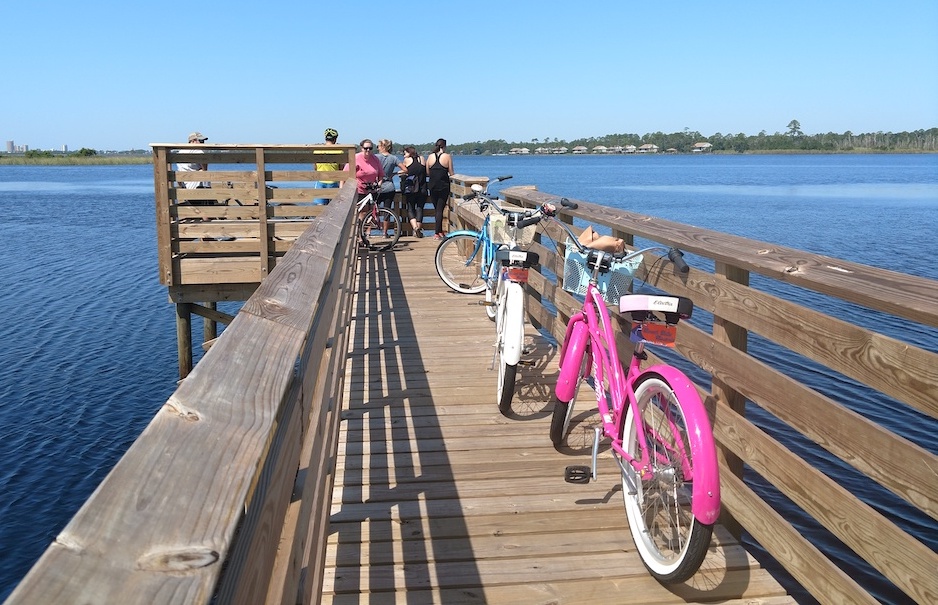 bikes and people on boardwalk in Gulf shores, alabama