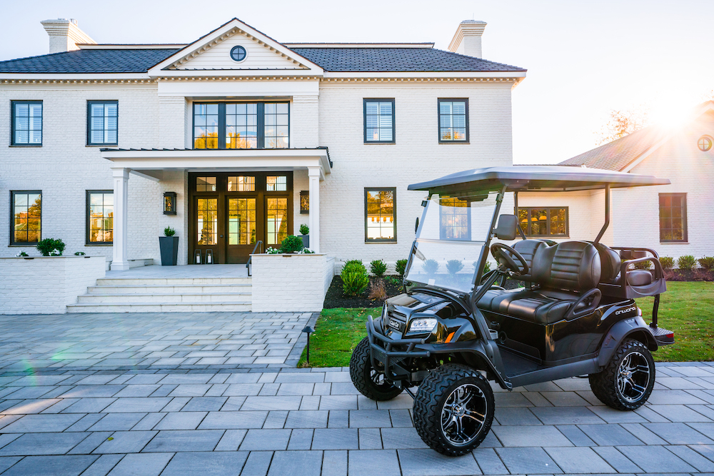 golf cart in front of the estate at Kingsmill Resort