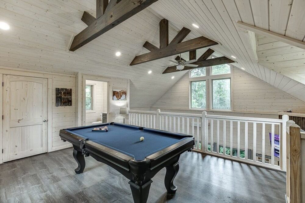 game room at Marvel Falls, a treehouse rental in Georgia