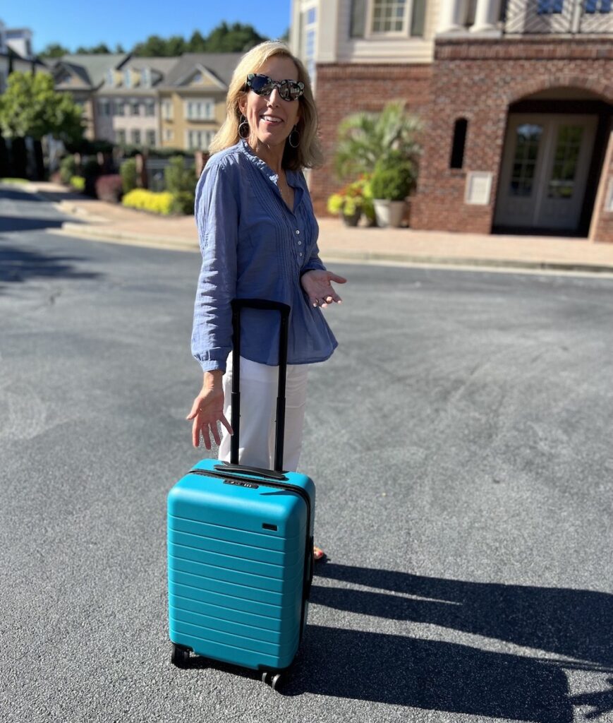 Jan Schroder with Away suitcase
