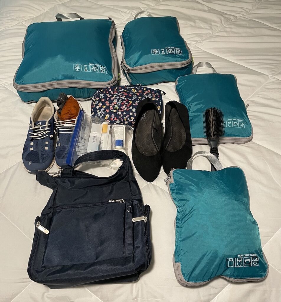 packing cubes and other items to go in a suitcase