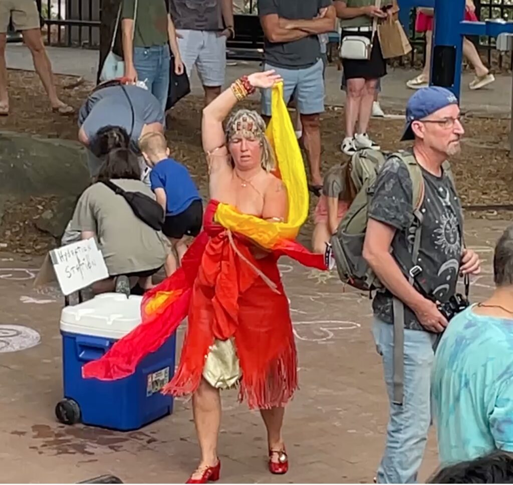 a dancer at Friday night drum circle